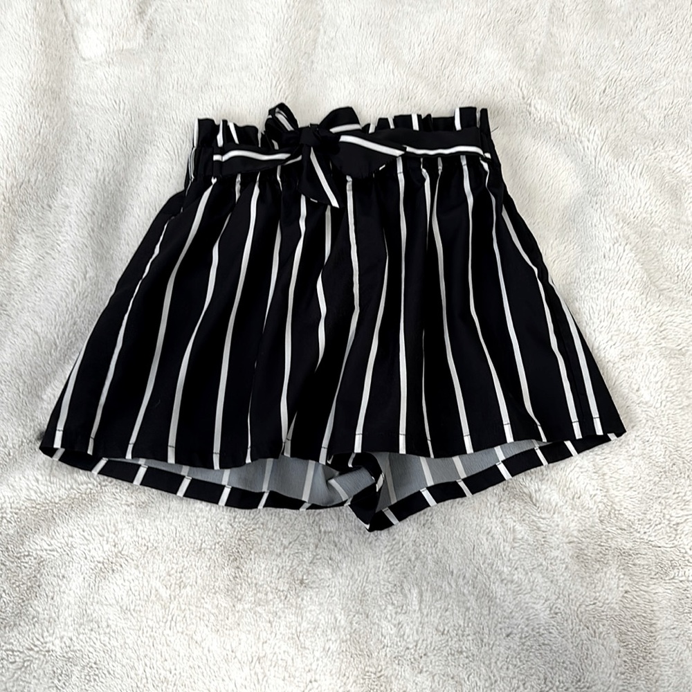 11-12 made in china black shorts with white stripes and a cute bow